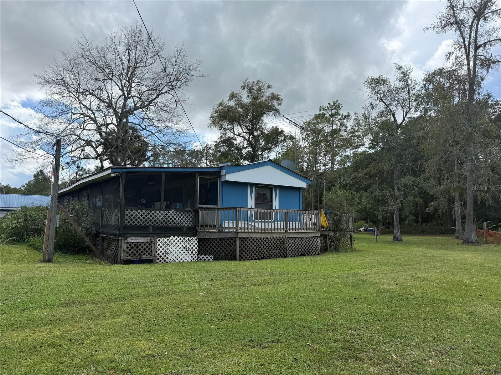 Manufactured Home at 1844 PAPAYA ST, BUNNELL, photo 5 of 33