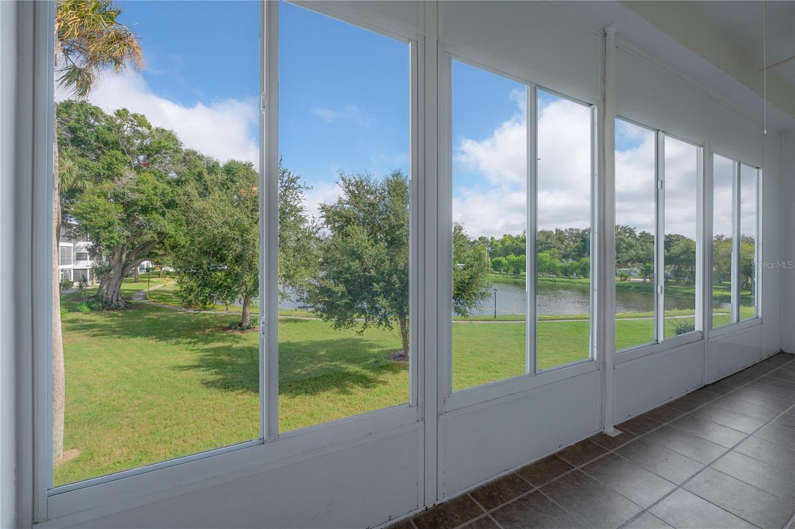 Lanai with view of lake - 8055 112TH ST #205, SEMINOLE