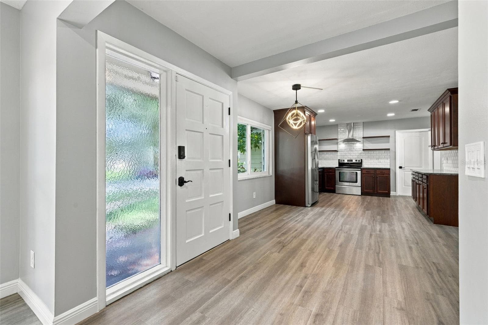 This home gets plenty of natural light and has a great floor plan with 3 bedrooms and a bonus room with fireplace! - 2260 SAINT CHARLES DR, CLEARWATER
