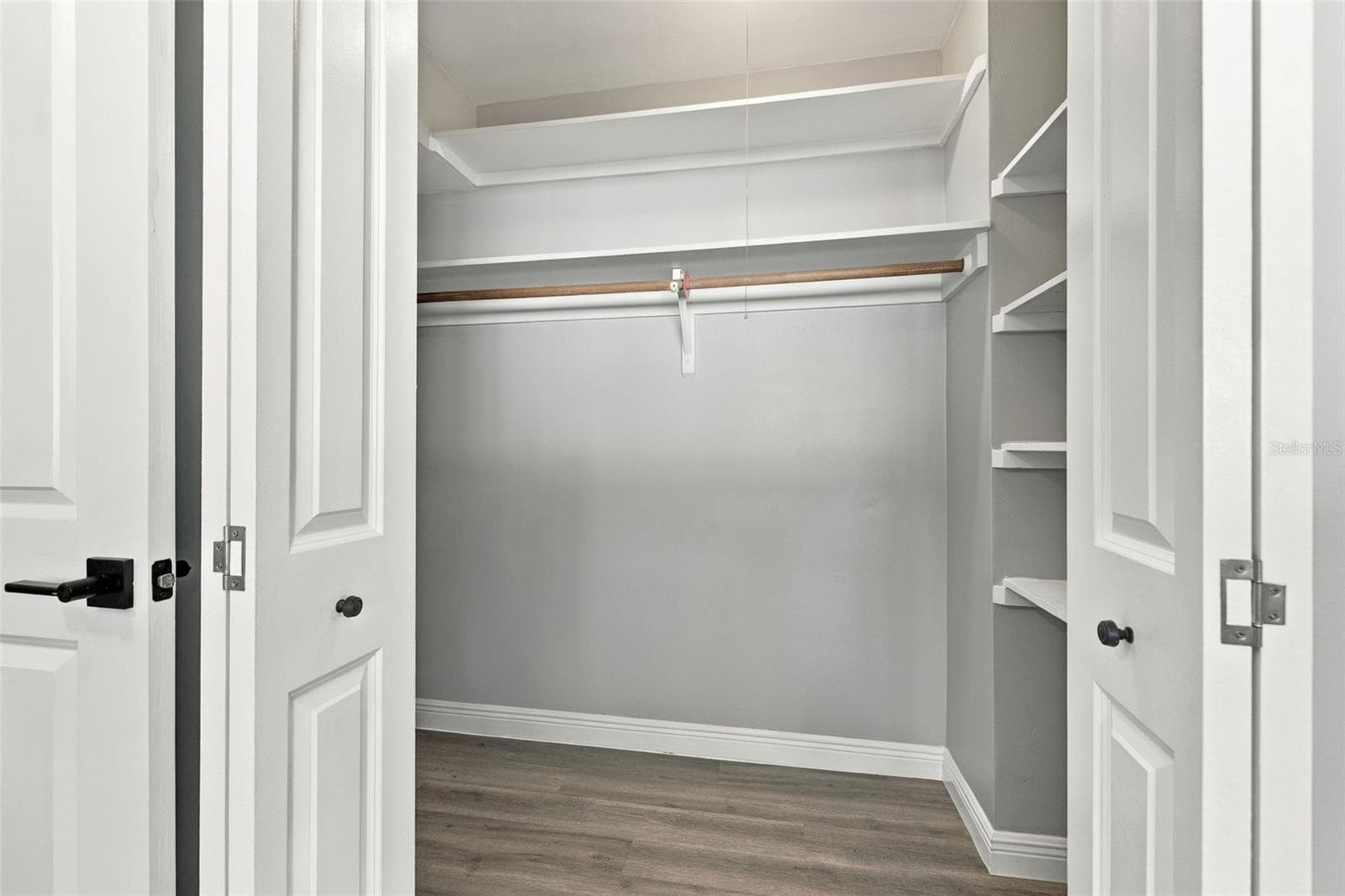 Spacious walk-in closet. - 2260 SAINT CHARLES DR, CLEARWATER