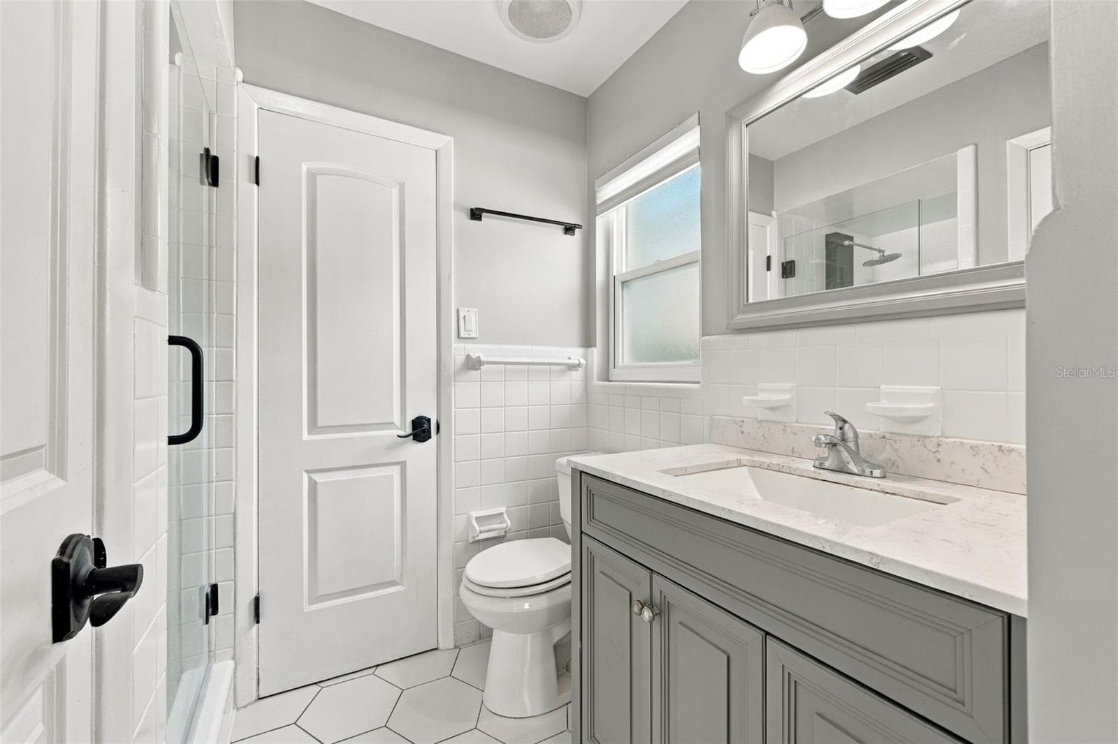 The primary bathroom has been nicely updated. - 2260 SAINT CHARLES DR, CLEARWATER