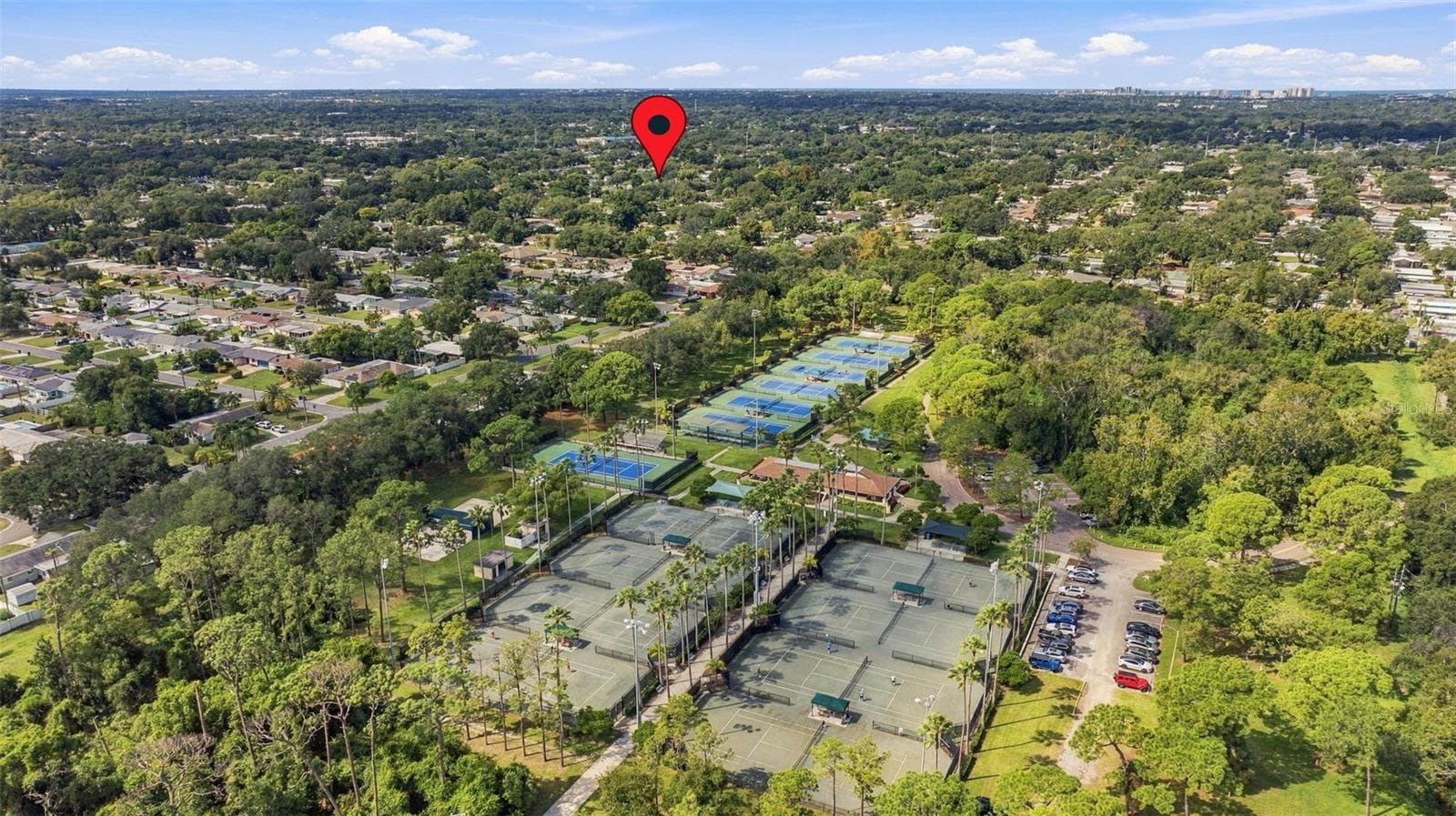 The McMullen Tennis Complex is less than a mile away with clay and hard courts for tennis and pickleball. - 2260 SAINT CHARLES DR, CLEARWATER