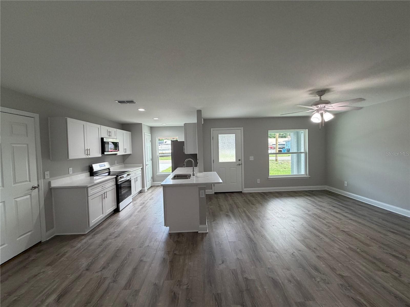 Kitchen-living room view - 745 N 3RD ST, EAGLE LAKE