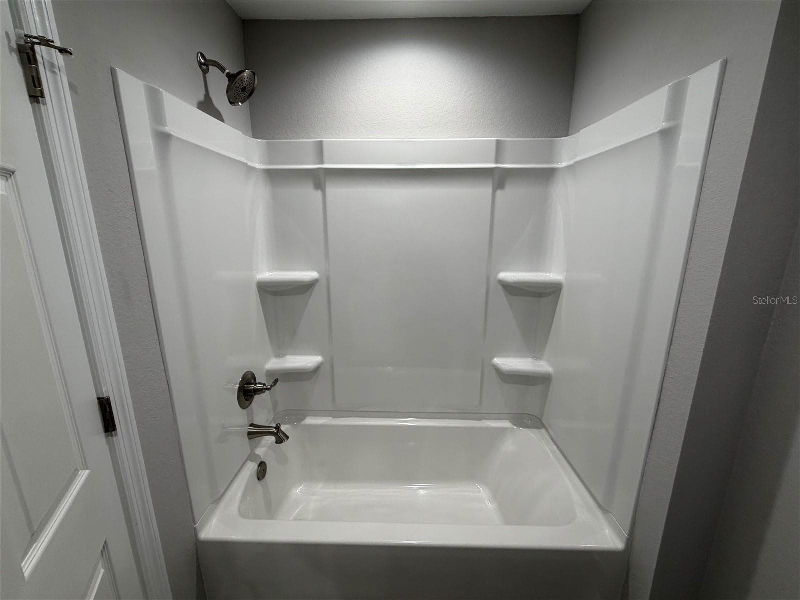 Primary bath shower/tub combo - 745 N 3RD ST, EAGLE LAKE