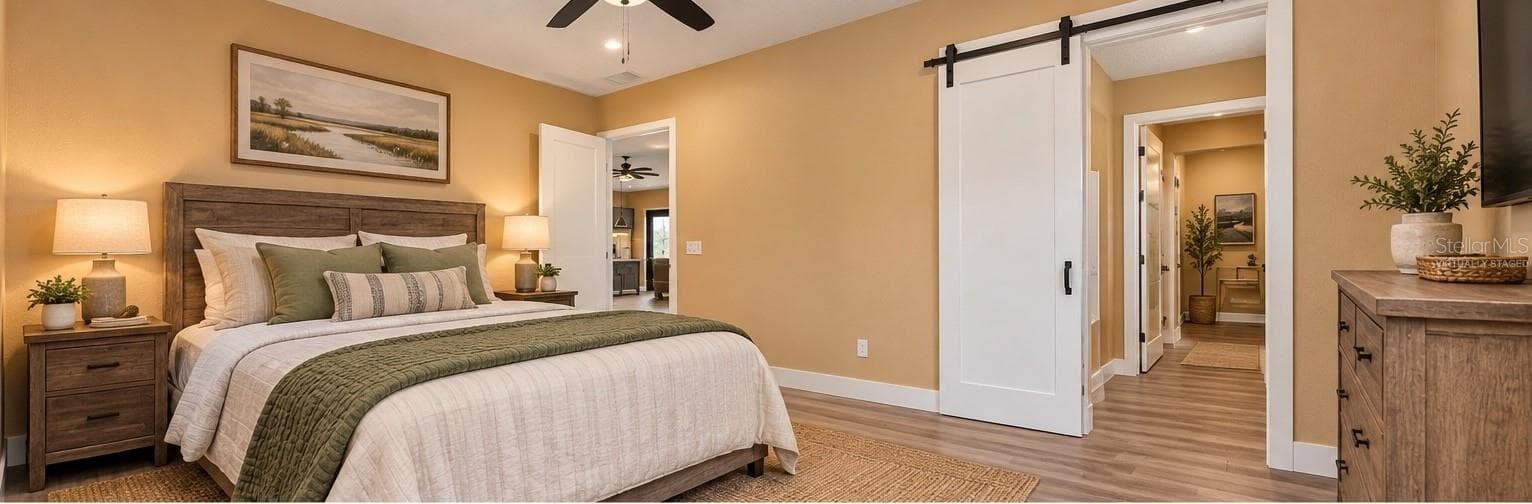 Virtually Staged Primary Bedroom - 2540 NE 77TH RD, WILDWOOD
