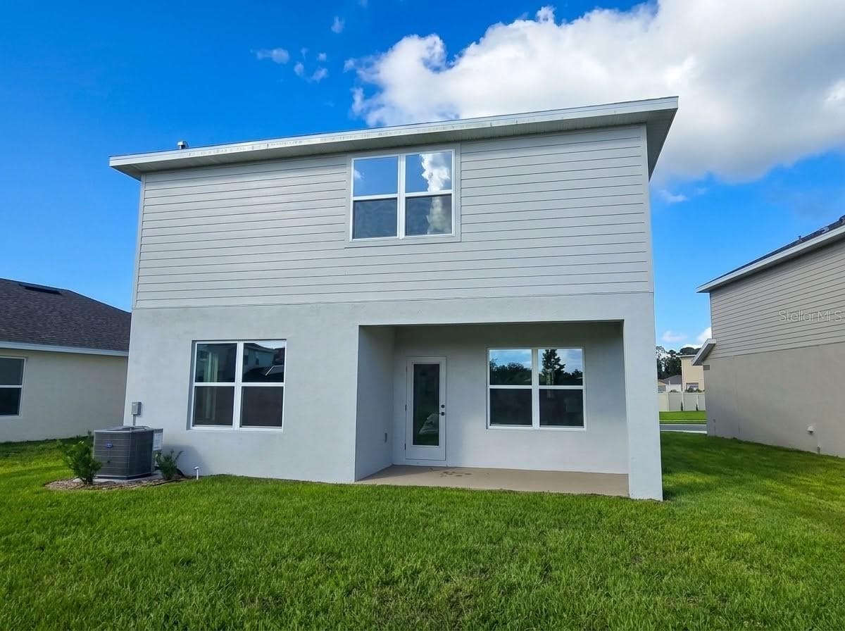 REAR EXTERIOR - 3620 BRIARLYNNE WAY, ST CLOUD