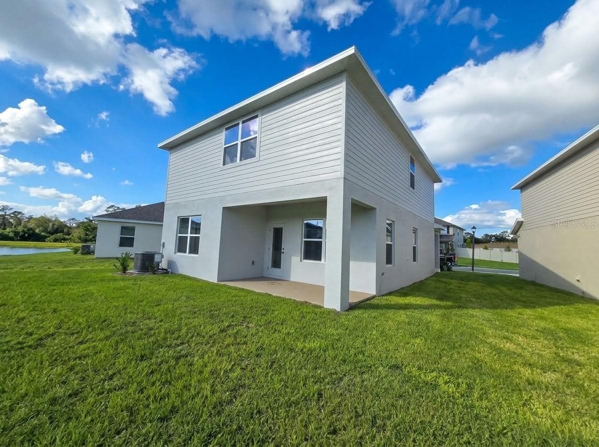 REAR EXTERIOR - 3620 BRIARLYNNE WAY, ST CLOUD