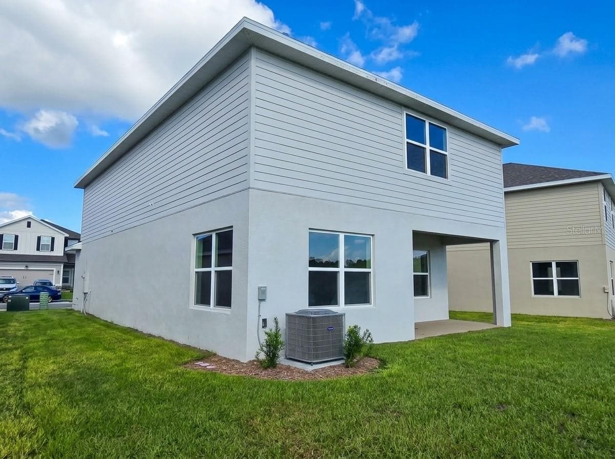 REAR EXTERIOR - 3620 BRIARLYNNE WAY, ST CLOUD