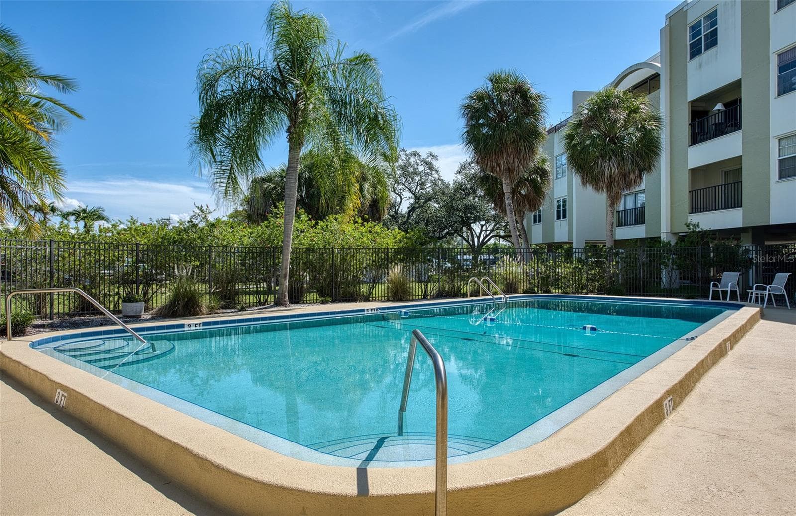 community pool right outside your door - 4681 1ST ST NE #301, ST PETERSBURG