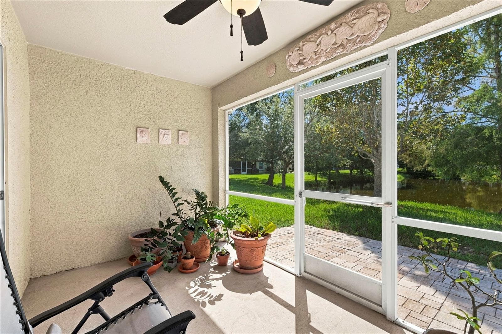 Back screened porch. - 11193 KAPOK GRAND CIR, SEMINOLE