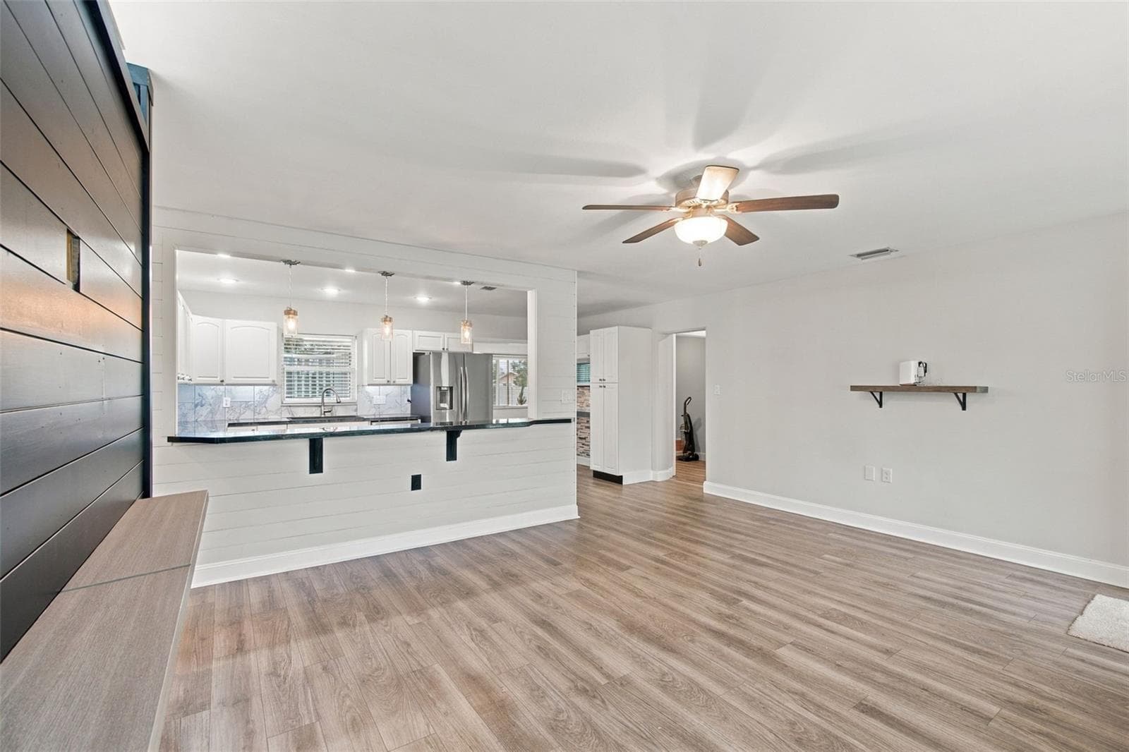 Living Room to Kitchen to Dining Room - 930 DORA AVE, TAVARES
