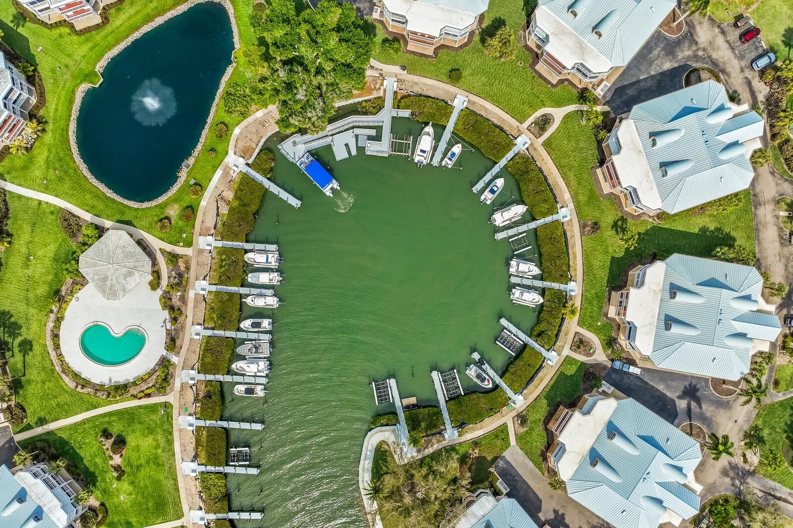 Newly renovated boat basin - low profile lifts can be installed by those who lease a slip after the Closing. - 11000 PLACIDA RD #1073, PLACIDA