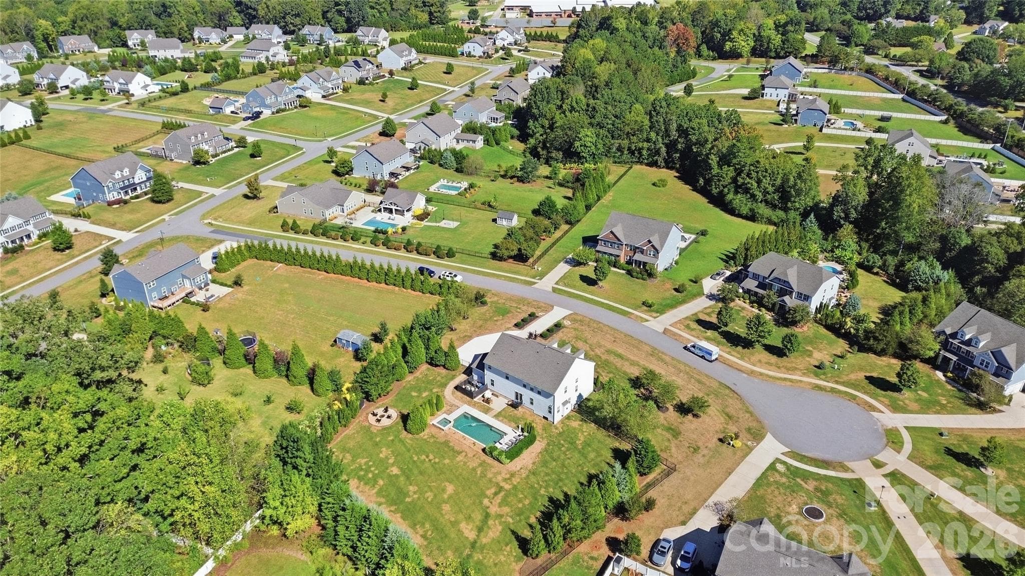 The Brookmeade community is made up of large homesites, mature trees, and sidewalks throughout. - 912 Manorwood Drive, Waxhaw