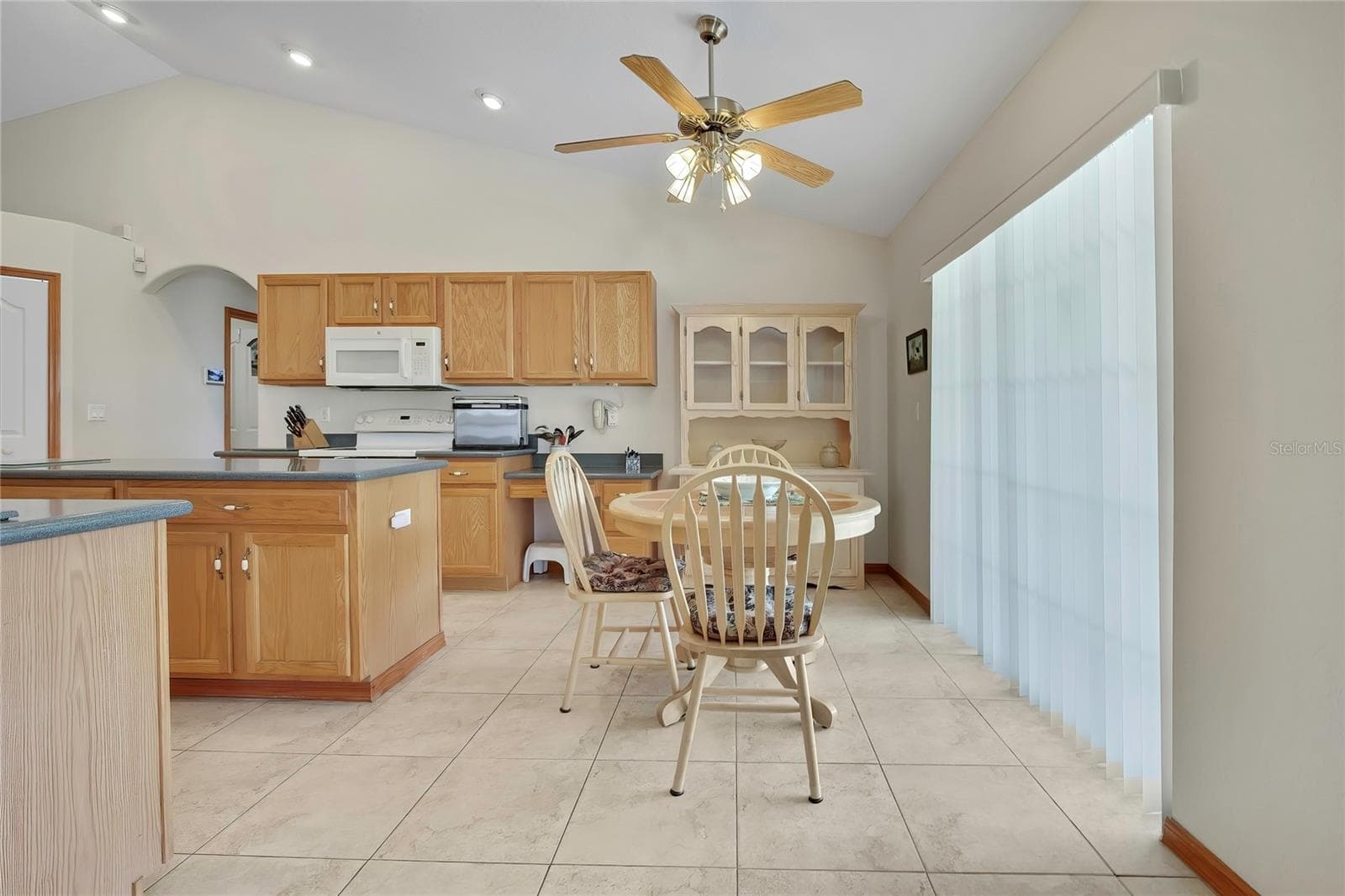 Dining Area near kitchen and sliders to Florida Room - 4583 GONDOLIER RD, SPRING HILL