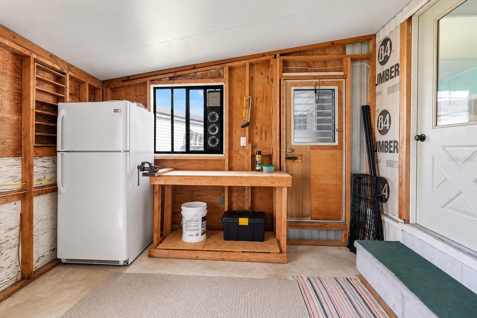 Garage with workbench - 1405 WESTLAND DR, TAVARES