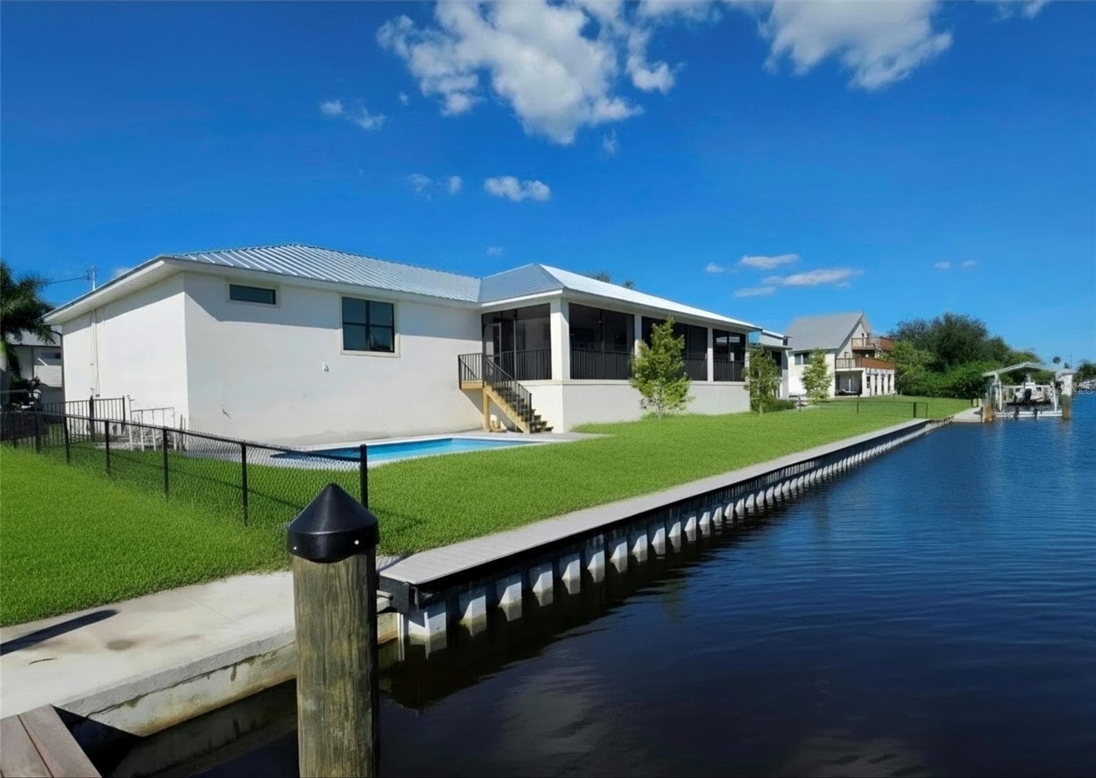 Single Family Residence at 24317 TREASURE ISLAND BLVD, PUNTA GORDA, photo 4 of 72