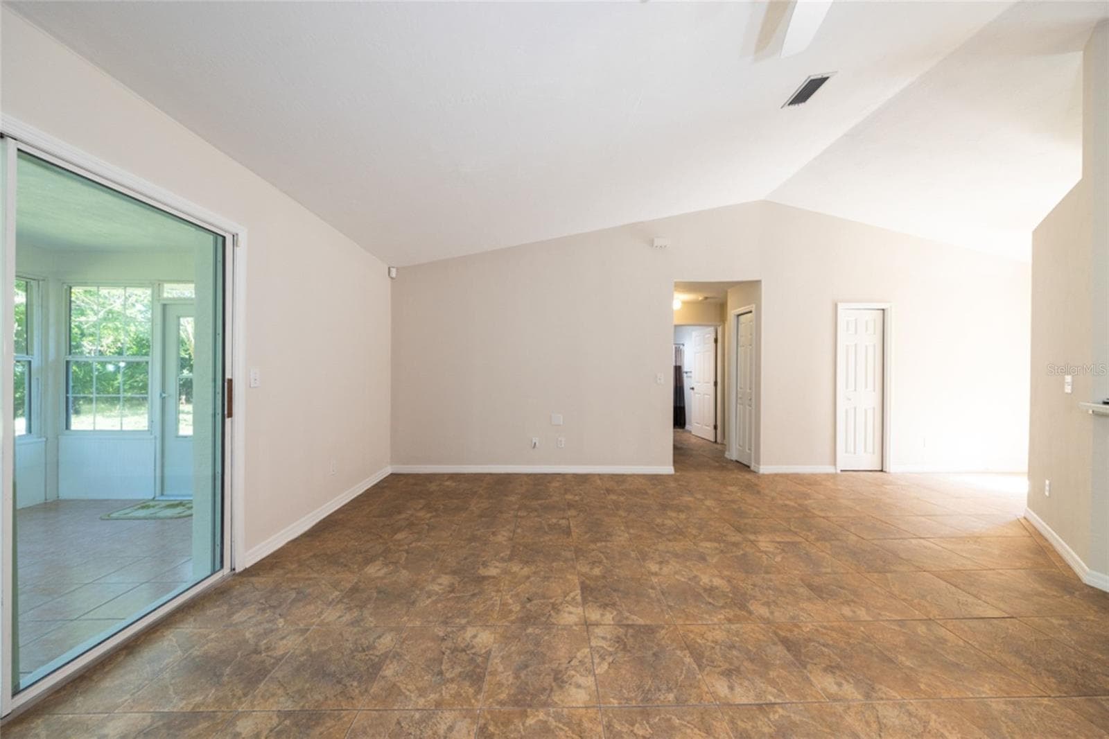 living room looking towards the secondary bedrooms. - 141 BREN MAR LN, PALM COAST