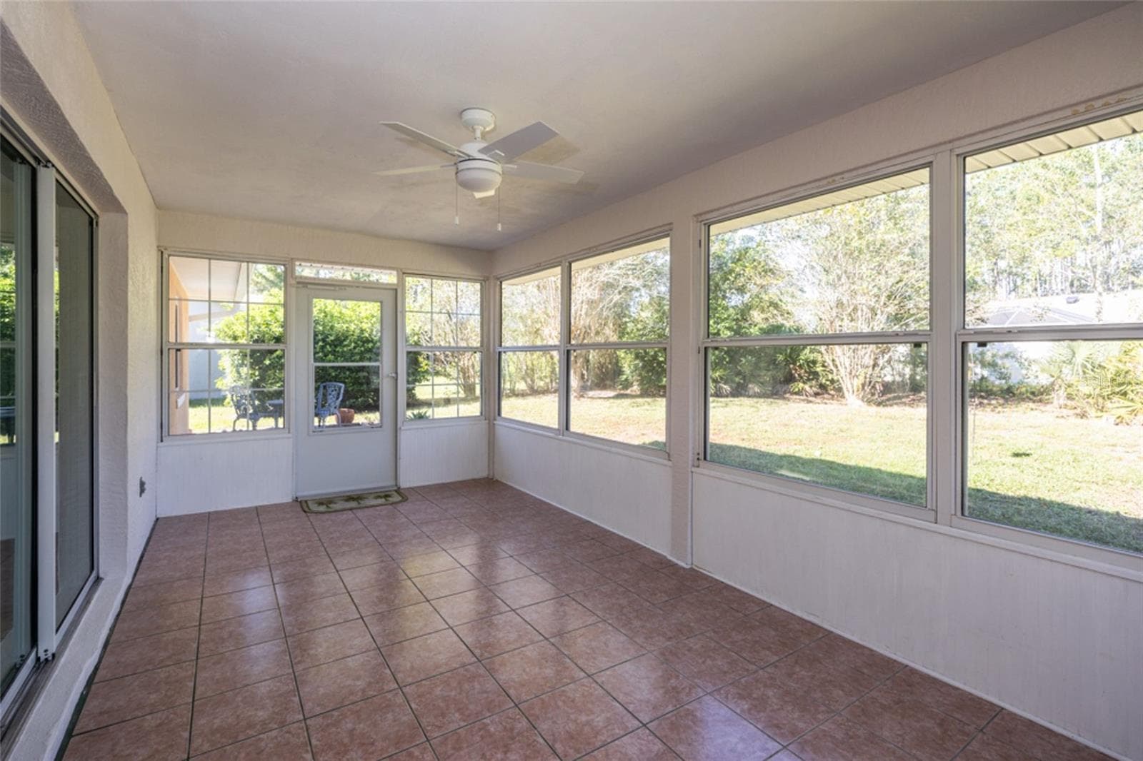 Florida room with tile flooring - 141 BREN MAR LN, PALM COAST