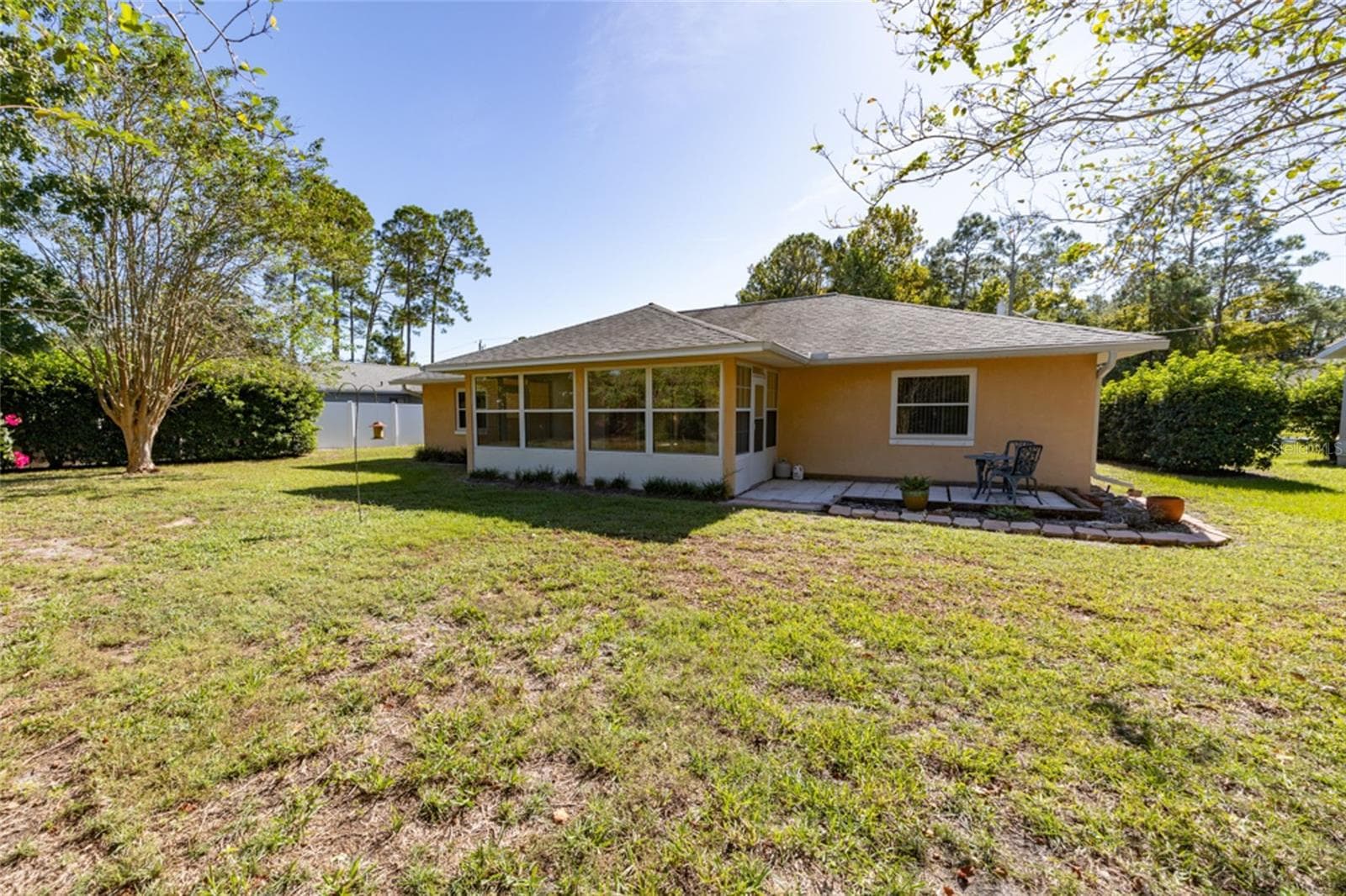 141 Bren Mar backyard. Plenty of room for a pool, shed, play equipment. - 141 BREN MAR LN, PALM COAST