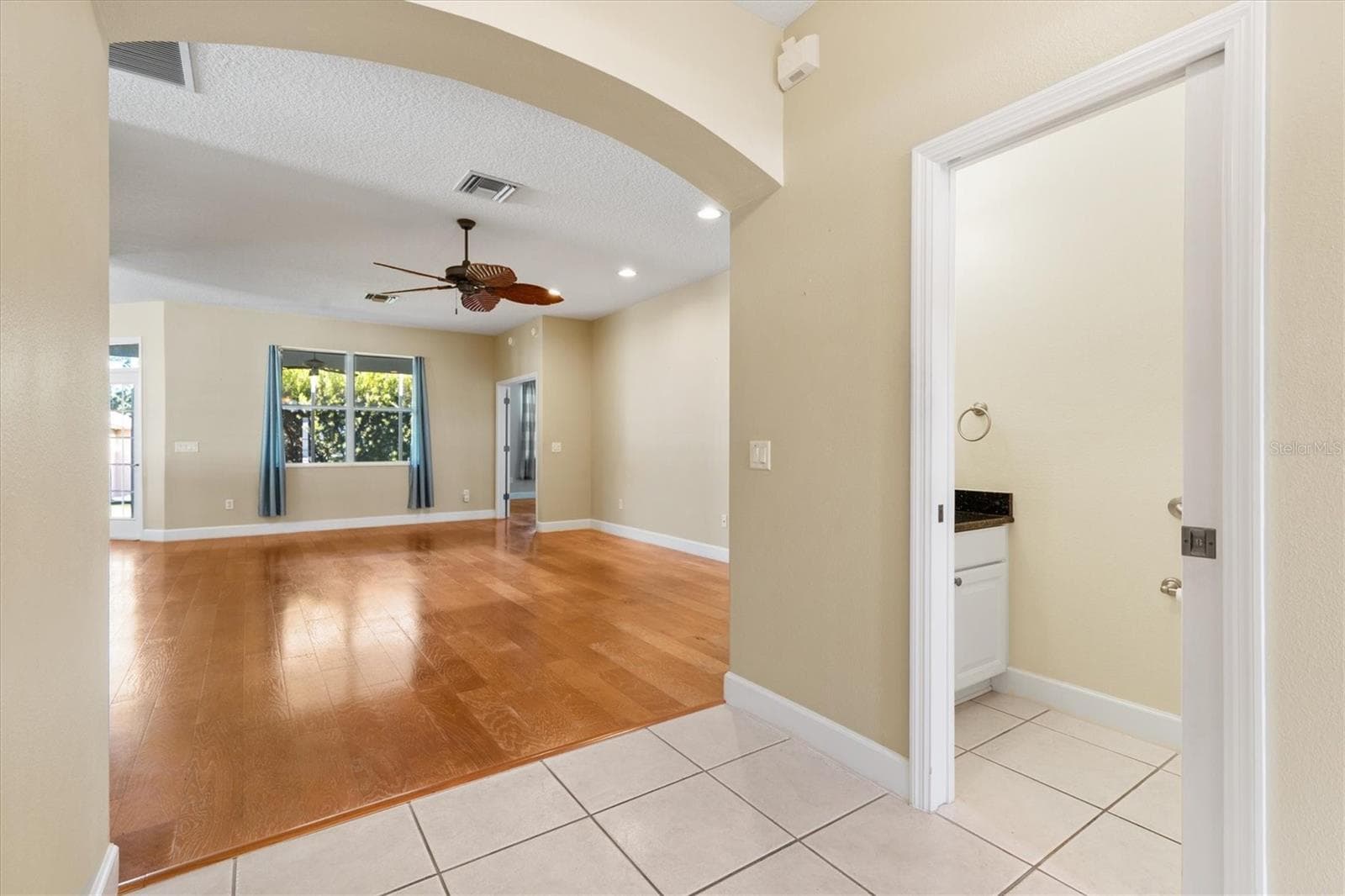 DOOR TO THE RIGHT IS A HALF BATH - 1025 WINNSBORO DR, THE VILLAGES