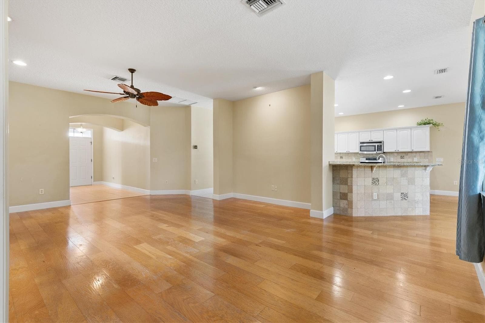 TILE KICKSPACE ON BREAKFAST BAR - 1025 WINNSBORO DR, THE VILLAGES