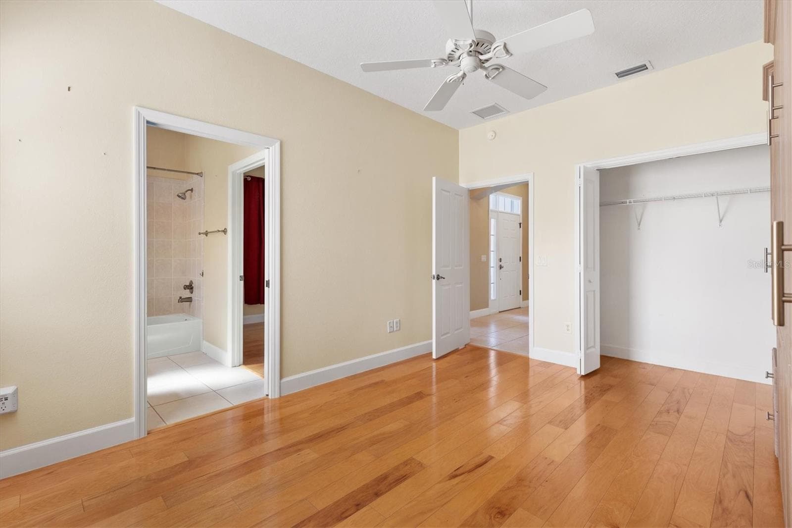 HAS A CEILING FAN AND A CLOSET*DOORWAY ON THE LEFT LEADS TO THE JACK & JILL BATHROOM - 1025 WINNSBORO DR, THE VILLAGES