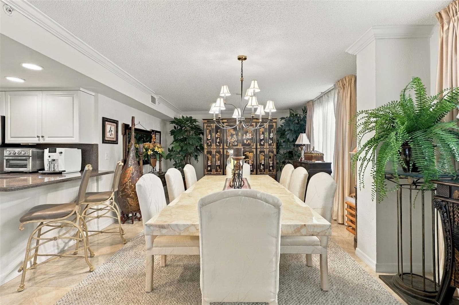 Dining Room features elegant tile and dining table seating 8 - 3 OCEANS WEST BLVD #7D7, DAYTONA BEACH SHORES