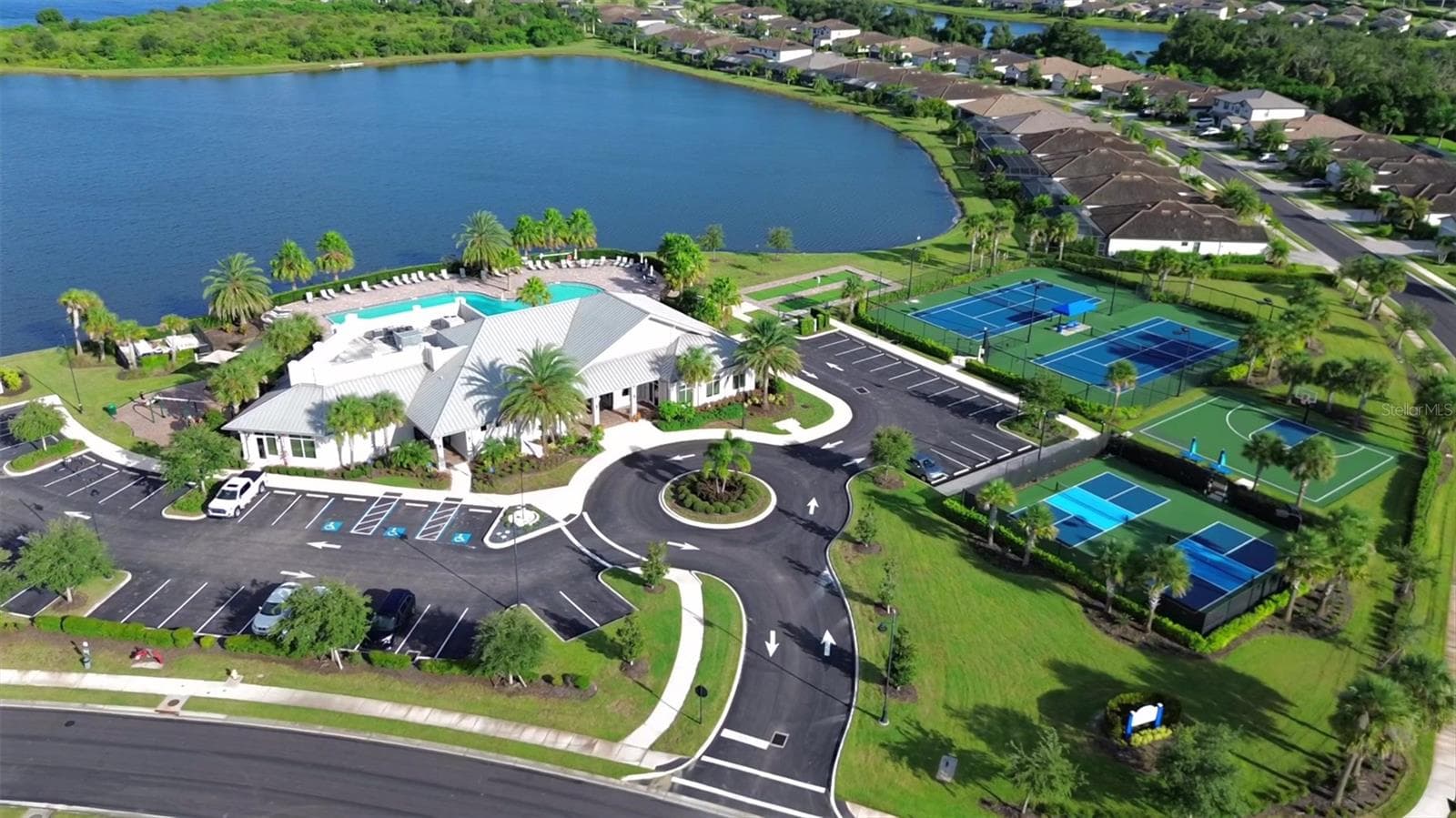 Polo Run amenity center on the lake: clubhouse, pool, tennis and pickleball - 17635 POLO TRL, BRADENTON