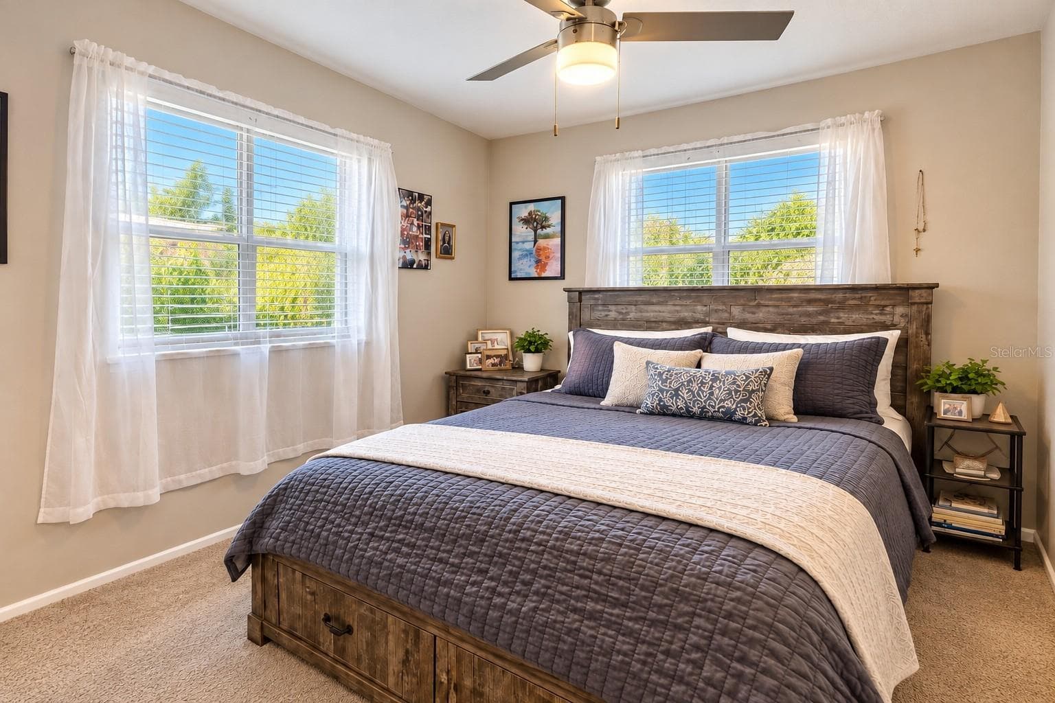 Primary bedroom with new carpet and fresh, neutral finishes. - 8514 93RD AVE, SEMINOLE