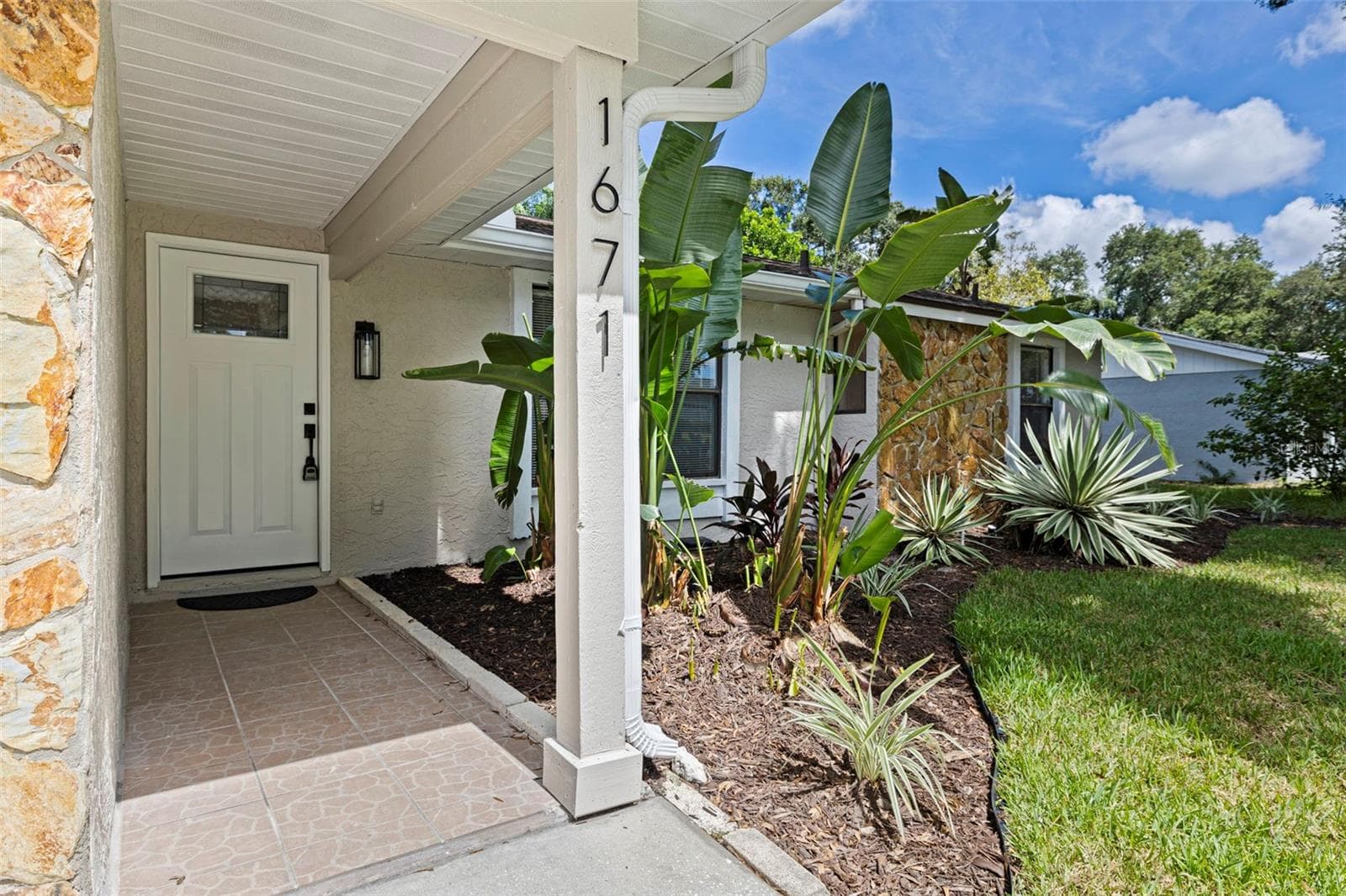 Single Family Residence at 1671 CASTLEWOOD LN, PALM HARBOR, photo 2 of 41