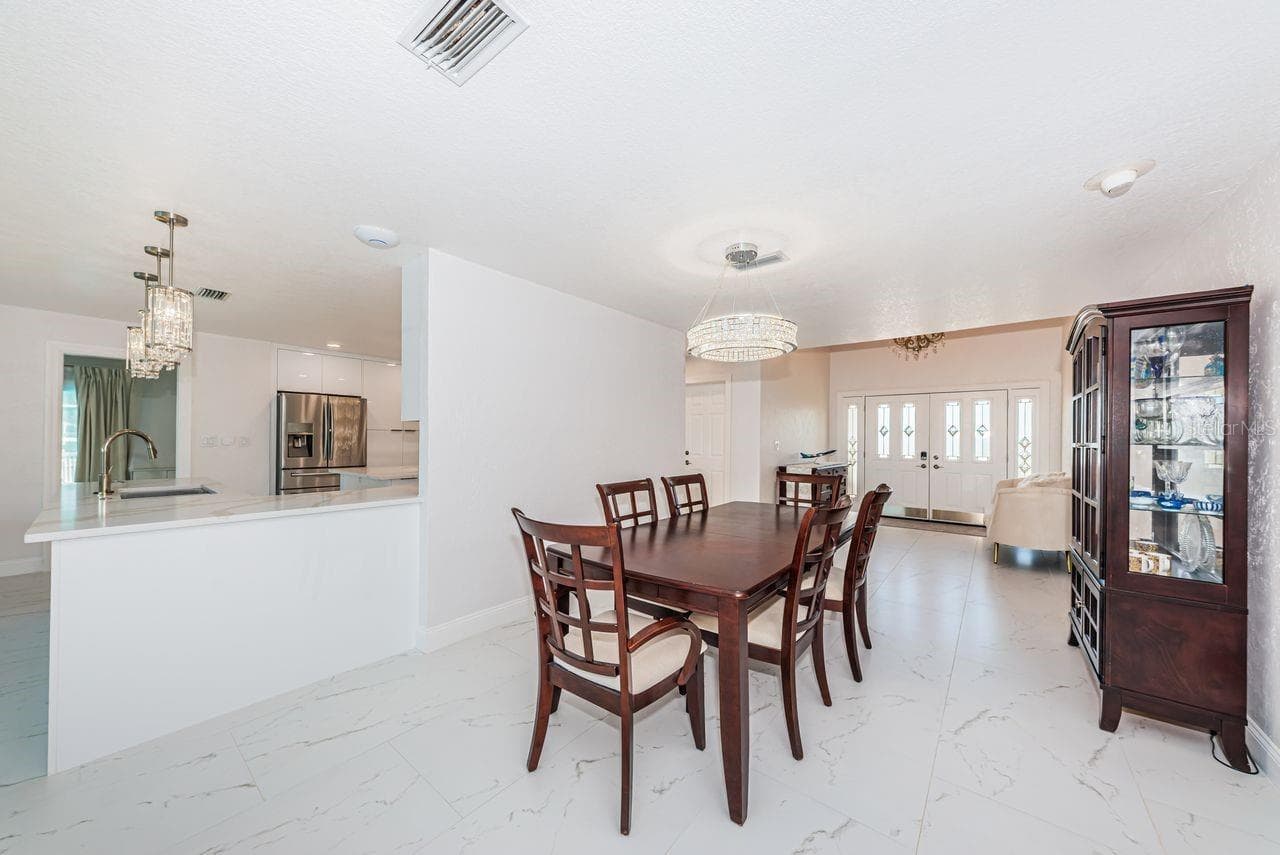 Foyer into the dining room - 4280 13TH LN NE, ST PETERSBURG