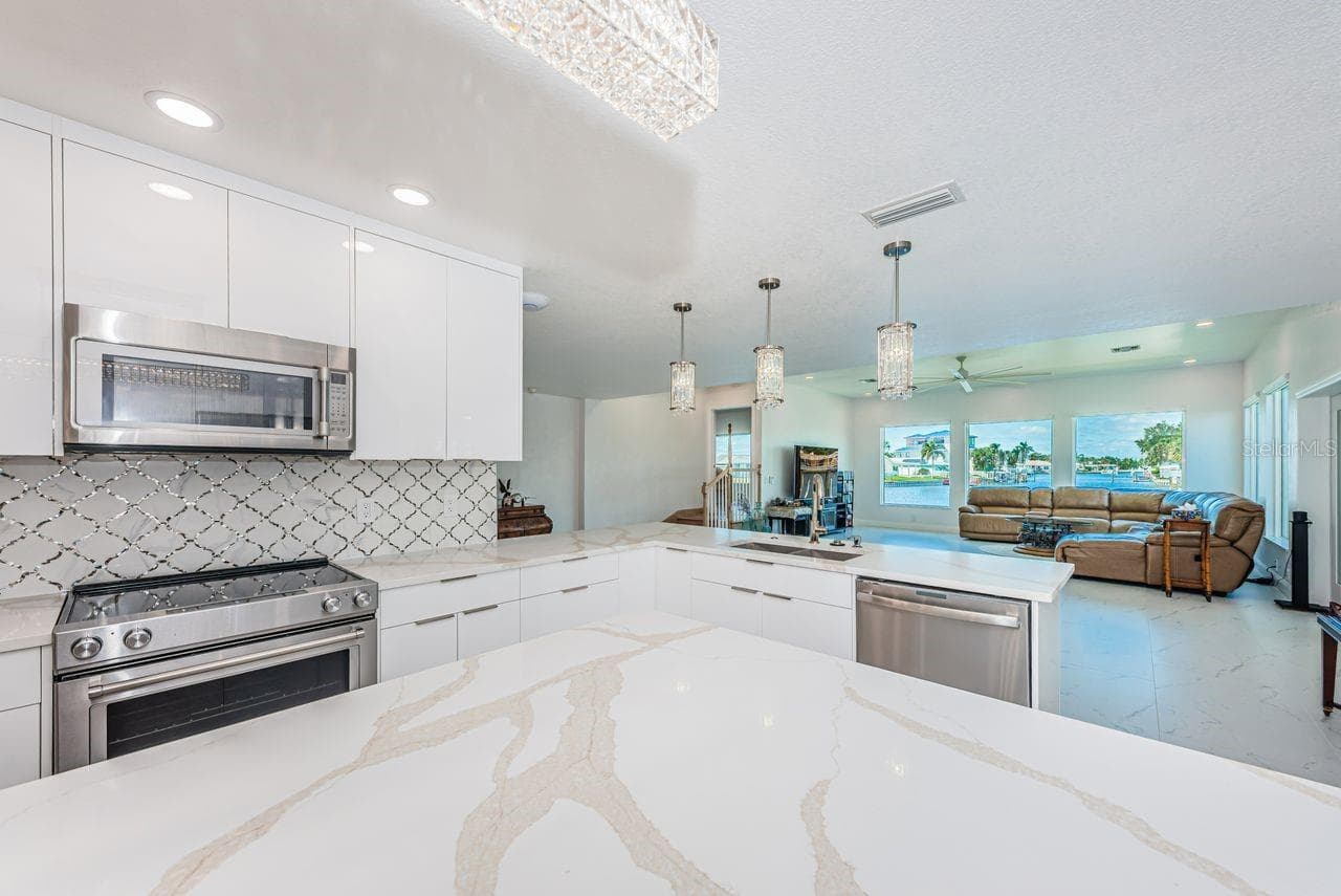 Lots of counter space with beautiful toe kick lighting and modern remote-controlled lighting - 4280 13TH LN NE, ST PETERSBURG