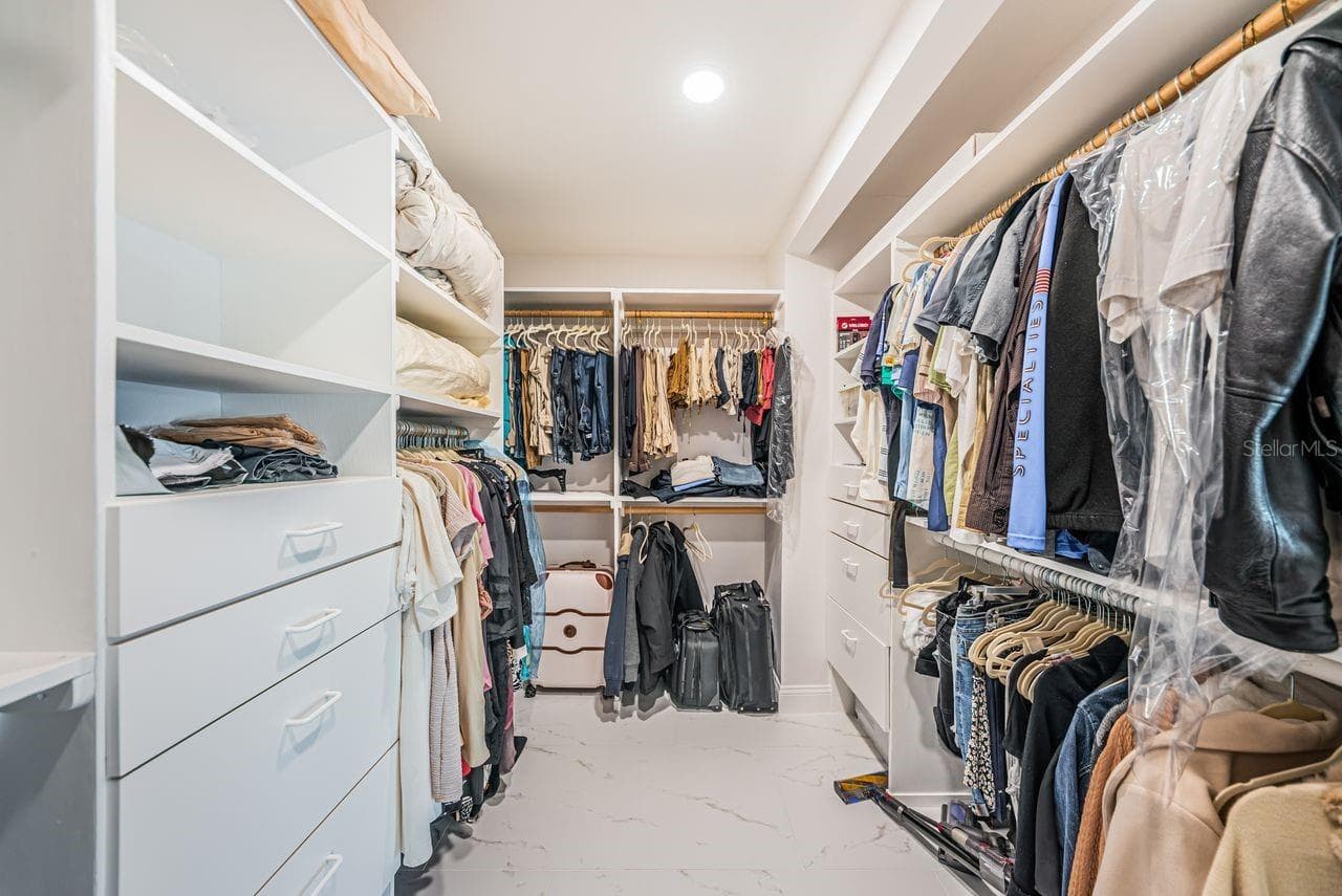 Primary custom walk-in closet - 4280 13TH LN NE, ST PETERSBURG