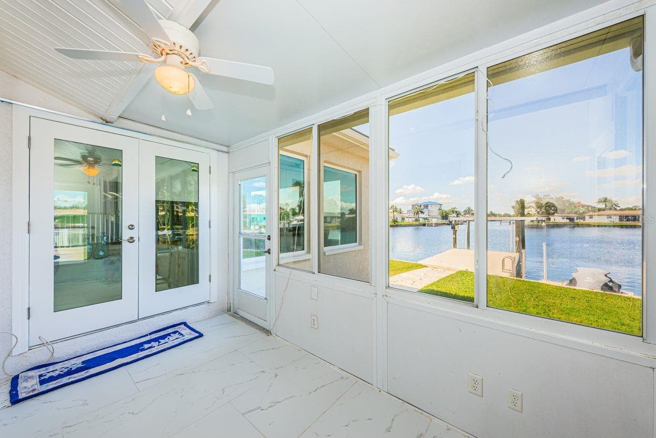 Enclosed back porch - 4280 13TH LN NE, ST PETERSBURG