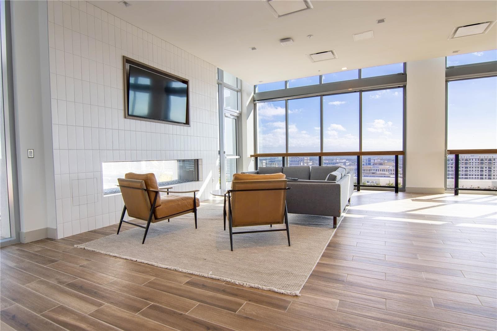 Beautiful community room with see through fireplace, tv, 3 walls of sliding glass doors, prep kitchen and more - 777 3RD AVE N #1503, ST PETERSBURG
