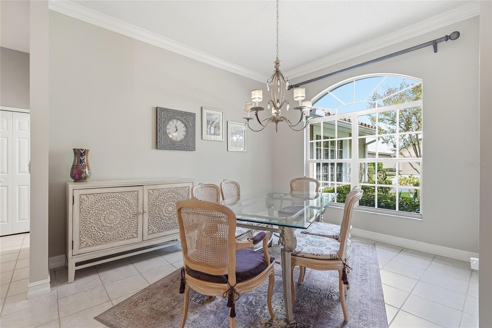 Large dining room in the front of the home. - 4851 WINDMILL PALM TER NE, ST PETERSBURG