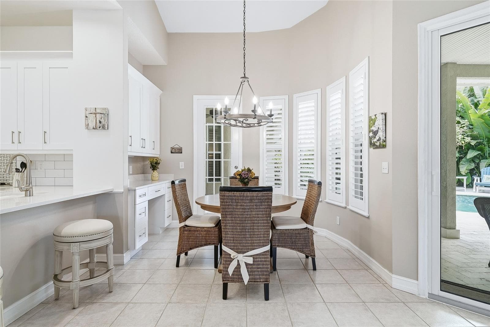 Spacious dinette lined by windows. - 4851 WINDMILL PALM TER NE, ST PETERSBURG