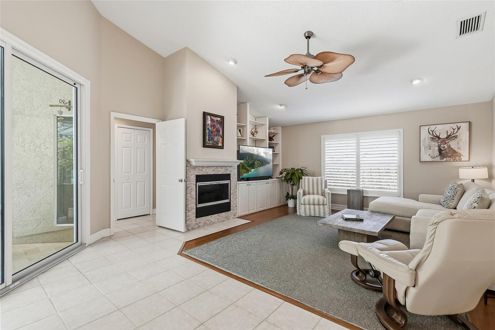 Cozy ambiance for watching the game, movie night or just a night of catching up. - 4851 WINDMILL PALM TER NE, ST PETERSBURG