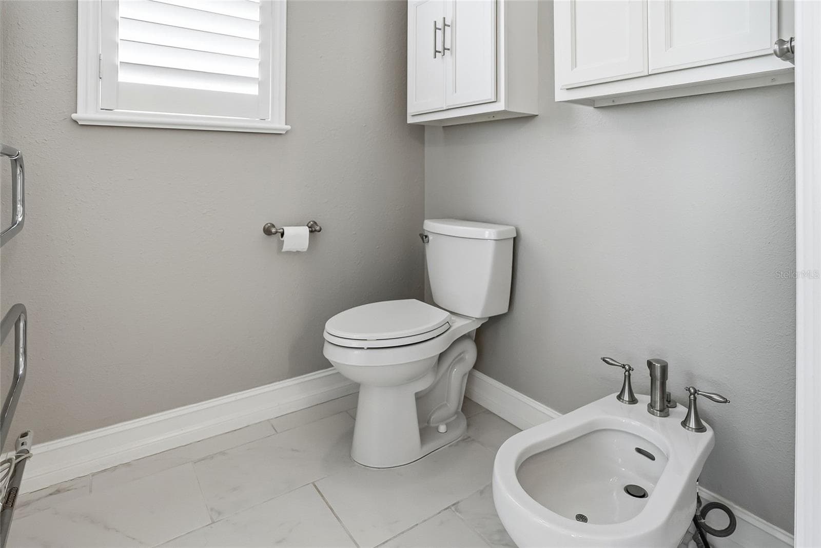 Separate commode, bidet and towel warmer for your shower experience. - 4851 WINDMILL PALM TER NE, ST PETERSBURG