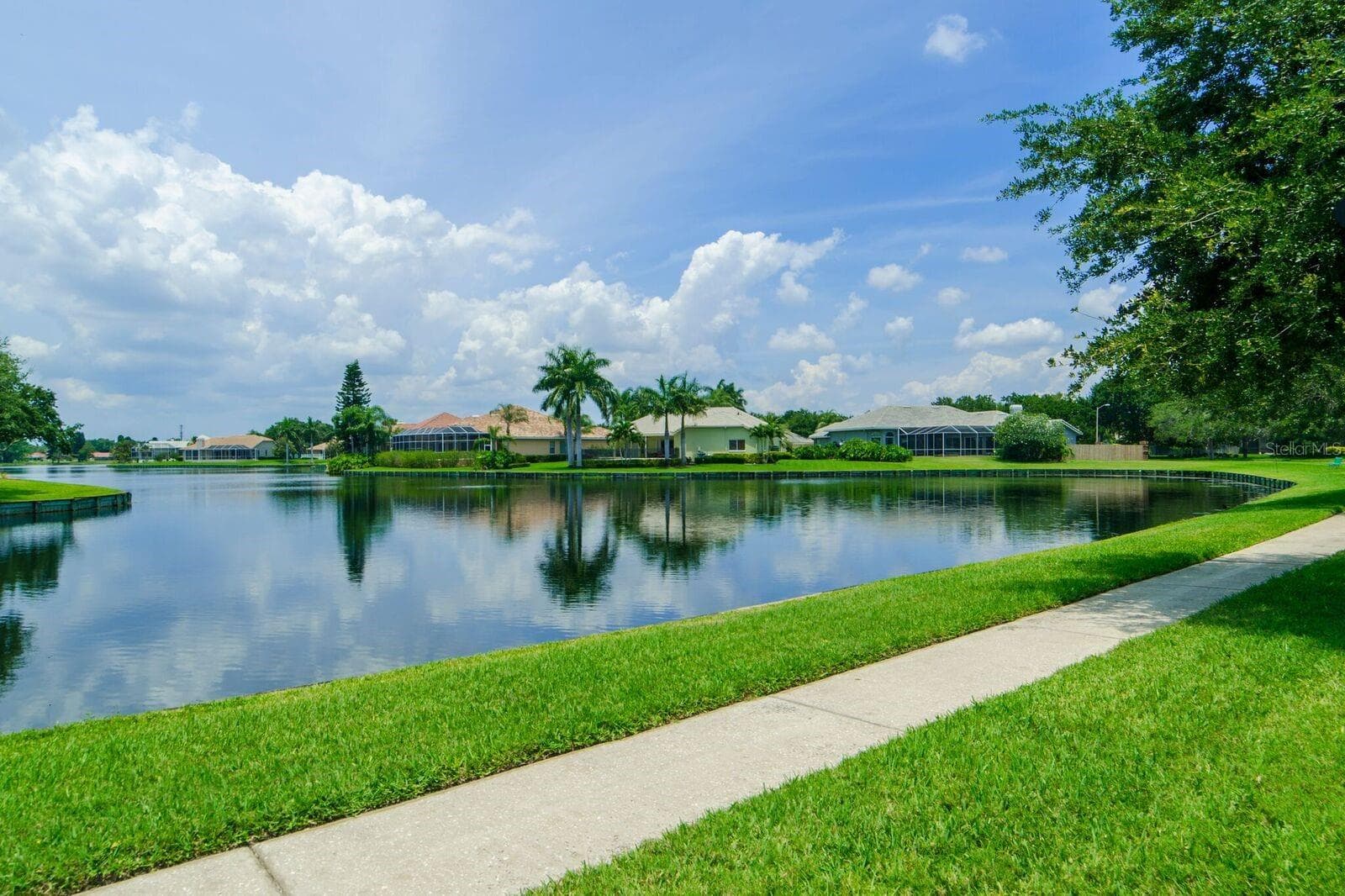 Placido Bayou features sidewalks for walking/jogging and lakes for fishing. - 4851 WINDMILL PALM TER NE, ST PETERSBURG