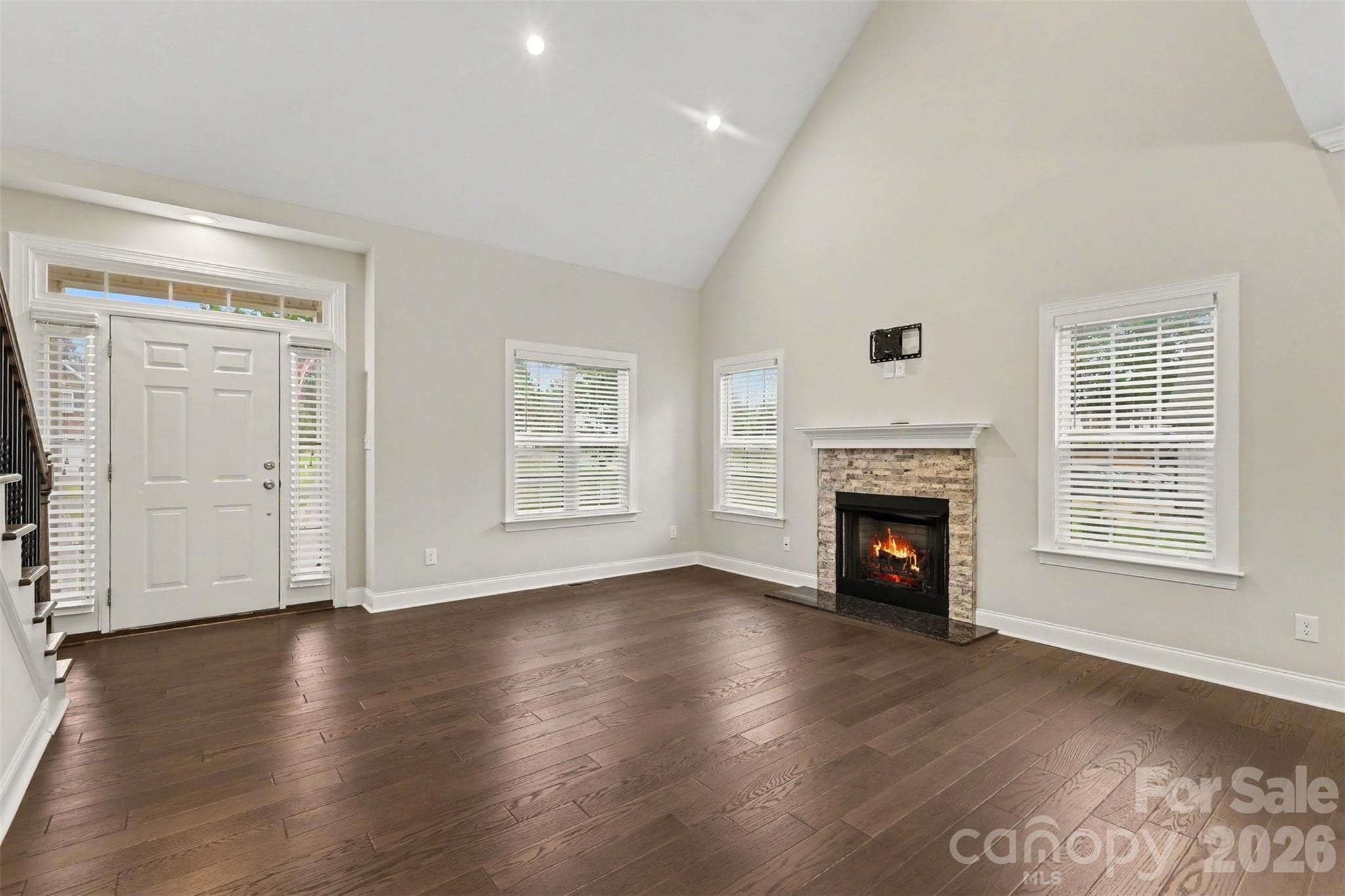 Open living room with vaulted ceiling - 3743 Travertine Drive, Lancaster