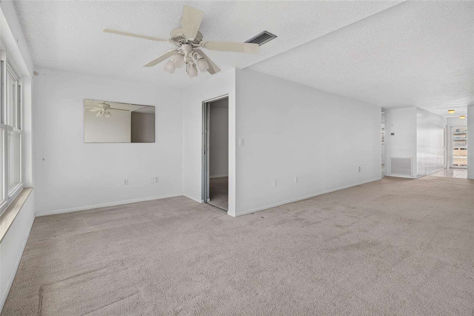 Sunroom/ Entrance to Primary Bedroom - 6025 SHORE BLVD S #303, GULFPORT