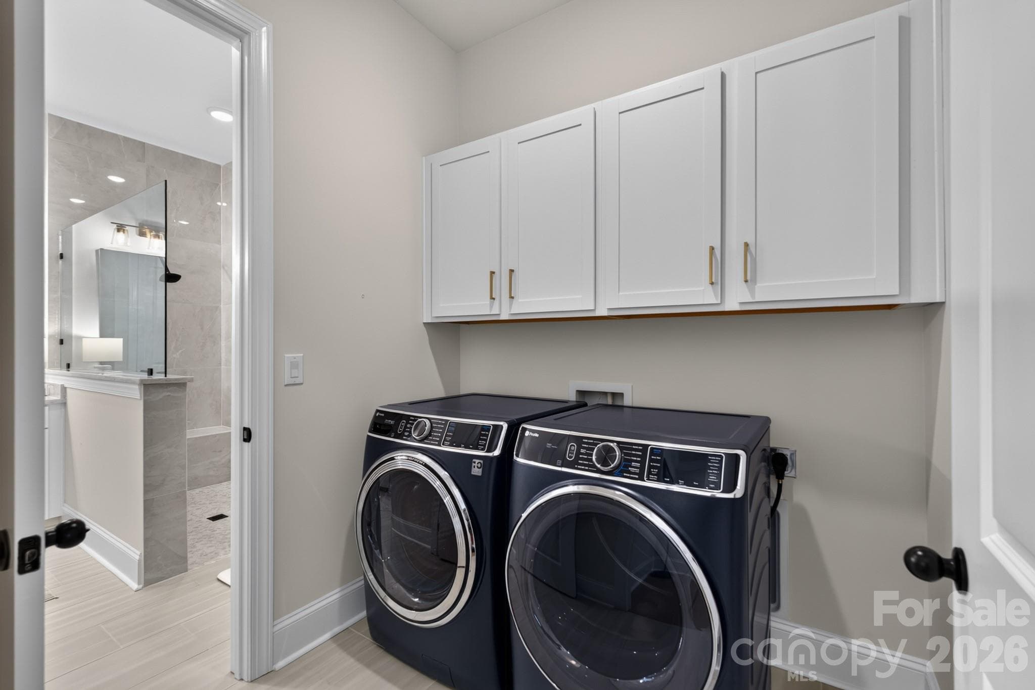 Laundry Room with Primary Bathroom Entry - 1018 Lowland Way, Waxhaw