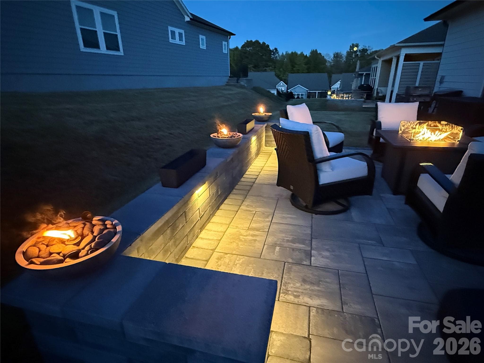 Outdoor Living Area Paver Patio Early Evening - 1018 Lowland Way, Waxhaw