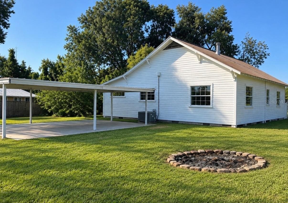 Back of Home w/ 4 Car Carport - 38404 MICKLER RD, DADE CITY