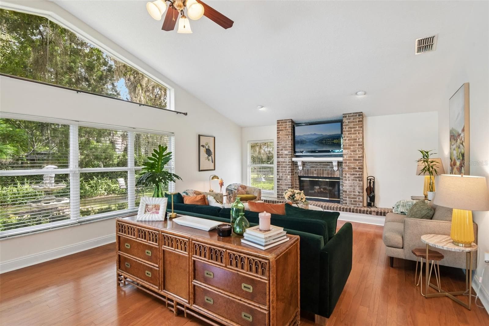 Large Family room with wood burning fireplace, and TONS of natural light! - 3503 OAK CLUB CT, PLANT CITY
