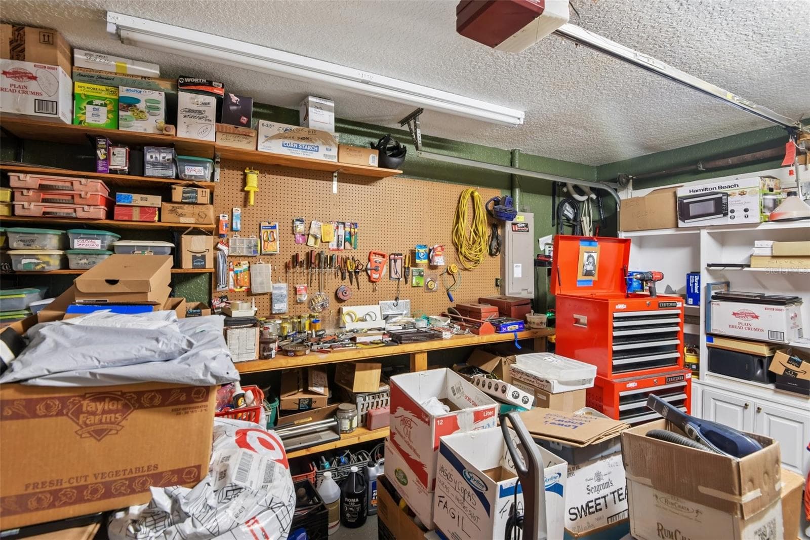 3rd garage bay - cooled shop space or easy to convert back. - 3503 OAK CLUB CT, PLANT CITY