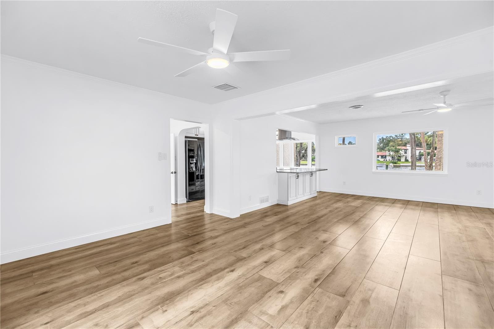 Dining Room looking into the family Room and Kitchen - 7204 GRAND BLVD, NEW PORT RICHEY