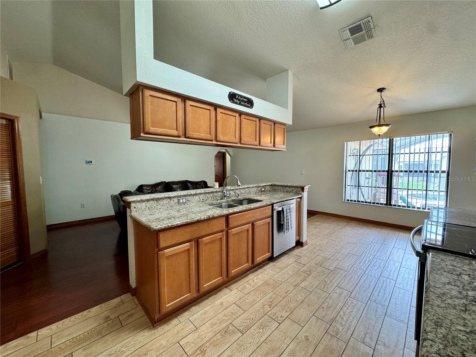 Kitchen overlooking Dinette and Living Room - 2207 DEATA CT, ST CLOUD