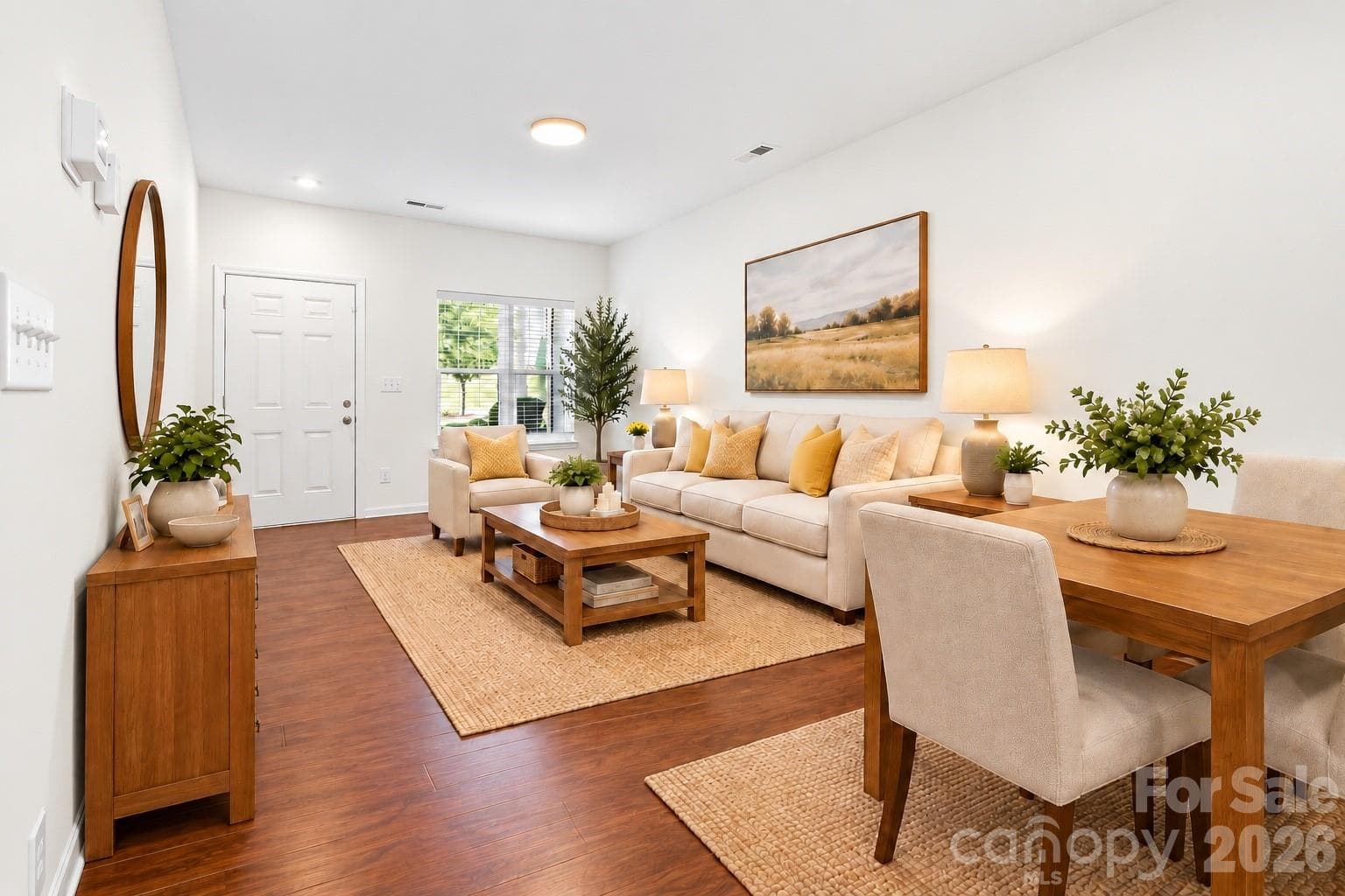 Virtually staged for a living room and dining area - 5516 John Mcdowell Place, Charlotte